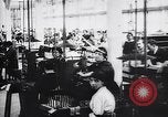 Image of French munitions factory workers in World War I France, 1915, second 19 stock footage video 65675027313