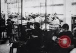 Image of French munitions factory workers in World War I France, 1915, second 20 stock footage video 65675027313