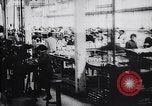 Image of French munitions factory workers in World War I France, 1915, second 22 stock footage video 65675027313
