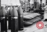 Image of French munitions factory workers in World War I France, 1915, second 32 stock footage video 65675027313