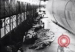Image of French technicians assembling a dirigible France, 1916, second 17 stock footage video 65675027316