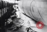 Image of French technicians assembling a dirigible France, 1916, second 20 stock footage video 65675027316