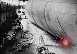 Image of French technicians assembling a dirigible France, 1916, second 21 stock footage video 65675027316