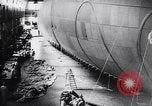 Image of French technicians assembling a dirigible France, 1916, second 22 stock footage video 65675027316