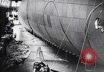 Image of French technicians assembling a dirigible France, 1916, second 23 stock footage video 65675027316