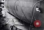 Image of French technicians assembling a dirigible France, 1916, second 24 stock footage video 65675027316