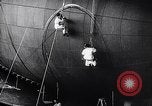 Image of French technicians assembling a dirigible France, 1916, second 29 stock footage video 65675027316
