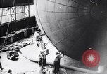 Image of French technicians assembling a dirigible France, 1916, second 37 stock footage video 65675027316
