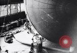 Image of French technicians assembling a dirigible France, 1916, second 39 stock footage video 65675027316