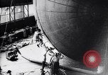Image of French technicians assembling a dirigible France, 1916, second 40 stock footage video 65675027316