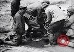Image of French soldiers unfolding uninflated observation balloon France, 1916, second 40 stock footage video 65675027329