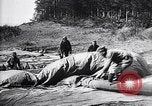 Image of French soldiers unfolding uninflated observation balloon France, 1916, second 44 stock footage video 65675027329