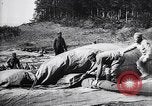 Image of French soldiers unfolding uninflated observation balloon France, 1916, second 46 stock footage video 65675027329