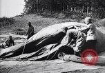 Image of French soldiers unfolding uninflated observation balloon France, 1916, second 48 stock footage video 65675027329