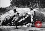 Image of French soldiers unfolding uninflated observation balloon France, 1916, second 52 stock footage video 65675027329