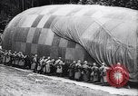 Image of French soldiers unfolding uninflated observation balloon France, 1916, second 59 stock footage video 65675027329