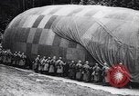 Image of French soldiers unfolding uninflated observation balloon France, 1916, second 60 stock footage video 65675027329
