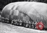 Image of French soldiers unfolding uninflated observation balloon France, 1916, second 61 stock footage video 65675027329