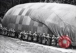 Image of French soldiers unfolding uninflated observation balloon France, 1916, second 62 stock footage video 65675027329