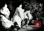 Image of Ku Klux Klan on horseback South Carolina United States USA, 1916, second 57 stock footage video 65675027386