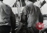 Image of Wilbur Wright adjusting transporter wheel on flyer United States USA, 1908, second 21 stock footage video 65675027433