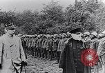 Image of President Poincaré presenting awards to soldiers World War I France, 1916, second 21 stock footage video 65675027516