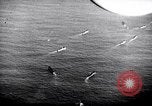 Image of US Navy bombarding Japanese fortifications on Iwo Jima Iwo Jima, 1945, second 7 stock footage video 65675027604