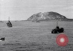 Image of US Navy bombarding Japanese fortifications on Iwo Jima Iwo Jima, 1945, second 25 stock footage video 65675027604