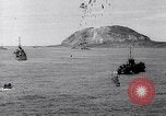 Image of US Navy bombarding Japanese fortifications on Iwo Jima Iwo Jima, 1945, second 26 stock footage video 65675027604