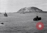 Image of US Navy bombarding Japanese fortifications on Iwo Jima Iwo Jima, 1945, second 27 stock footage video 65675027604