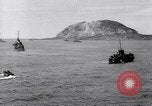 Image of US Navy bombarding Japanese fortifications on Iwo Jima Iwo Jima, 1945, second 28 stock footage video 65675027604
