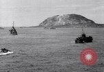 Image of US Navy bombarding Japanese fortifications on Iwo Jima Iwo Jima, 1945, second 29 stock footage video 65675027604