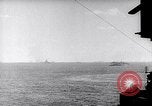Image of US Naval guns fire overhead during amphibious assault on Iwo Jima Iwo Jima, 1945, second 5 stock footage video 65675027605