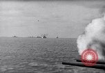 Image of US Naval guns fire overhead during amphibious assault on Iwo Jima Iwo Jima, 1945, second 8 stock footage video 65675027605