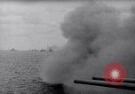 Image of US Naval guns fire overhead during amphibious assault on Iwo Jima Iwo Jima, 1945, second 10 stock footage video 65675027605