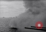 Image of US Naval guns fire overhead during amphibious assault on Iwo Jima Iwo Jima, 1945, second 11 stock footage video 65675027605
