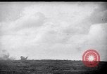 Image of US Naval guns fire overhead during amphibious assault on Iwo Jima Iwo Jima, 1945, second 17 stock footage video 65675027605