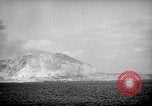 Image of US Naval guns fire overhead during amphibious assault on Iwo Jima Iwo Jima, 1945, second 30 stock footage video 65675027605