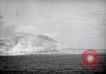 Image of US Naval guns fire overhead during amphibious assault on Iwo Jima Iwo Jima, 1945, second 31 stock footage video 65675027605