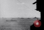 Image of US Naval guns fire overhead during amphibious assault on Iwo Jima Iwo Jima, 1945, second 33 stock footage video 65675027605