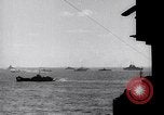 Image of US Naval guns fire overhead during amphibious assault on Iwo Jima Iwo Jima, 1945, second 35 stock footage video 65675027605