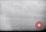 Image of US Naval guns fire overhead during amphibious assault on Iwo Jima Iwo Jima, 1945, second 49 stock footage video 65675027605