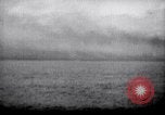 Image of US Naval guns fire overhead during amphibious assault on Iwo Jima Iwo Jima, 1945, second 52 stock footage video 65675027605