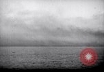 Image of US Naval guns fire overhead during amphibious assault on Iwo Jima Iwo Jima, 1945, second 53 stock footage video 65675027605