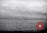 Image of US Naval guns fire overhead during amphibious assault on Iwo Jima Iwo Jima, 1945, second 54 stock footage video 65675027605