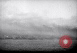 Image of US Naval guns fire overhead during amphibious assault on Iwo Jima Iwo Jima, 1945, second 59 stock footage video 65675027605