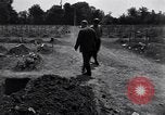 Image of Secretary of State Cordell Hull visits U.S. 4th Division Cemetery Normandy France, 1944, second 6 stock footage video 65675027617