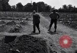 Image of Secretary of State Cordell Hull visits U.S. 4th Division Cemetery Normandy France, 1944, second 7 stock footage video 65675027617