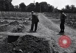 Image of Secretary of State Cordell Hull visits U.S. 4th Division Cemetery Normandy France, 1944, second 8 stock footage video 65675027617