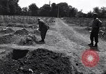 Image of Secretary of State Cordell Hull visits U.S. 4th Division Cemetery Normandy France, 1944, second 9 stock footage video 65675027617